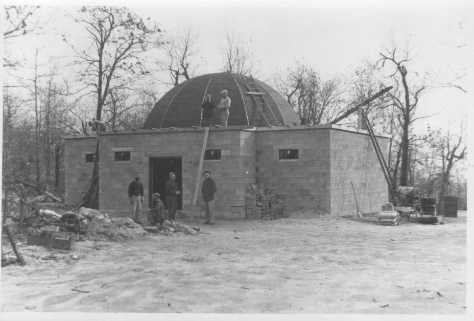 Headquarters under construction, dome framing rising, 1957.